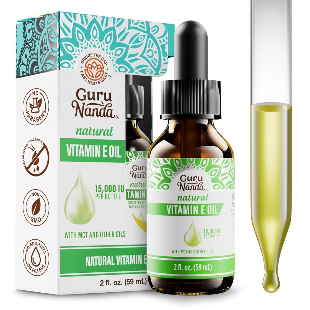 imageGuruNanda Vitamin E Oil 2 Fl Oz Pure ampamp Natural 15000 IU per Bottle for Skin Hair Face Nails ampamp Scars With Coconut Oil to Help Nourish ampamp Moisture NonGMO ampamp Vegan